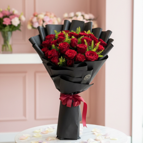 Luxury red roses bouquet wrapped in black paper